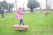 low level ropes course young girl platform and pulley crossing